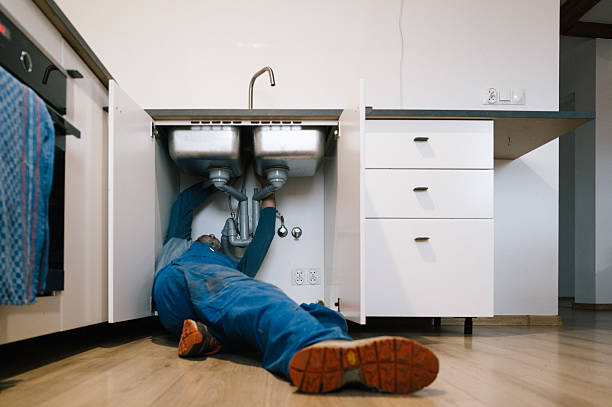 Professional Emergency Plumber technician working in Dunlevy, PA